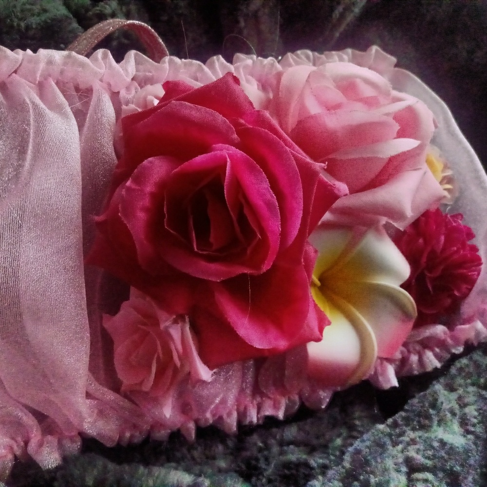 Handcrafted embellished wristlet bag